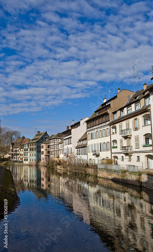 Historic houses on quay of Ill river. Strasbourg, France