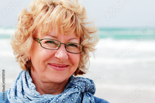 Portrait of happy senior woman at sea © dubova