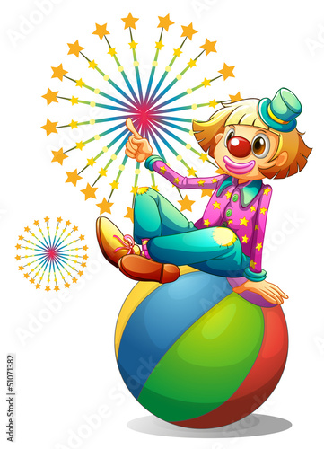 A clown above the inflatable ball