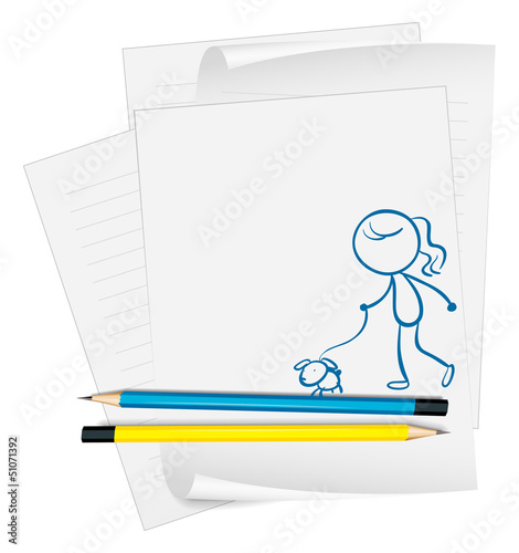 A paper with a sketch of a girl with a dog