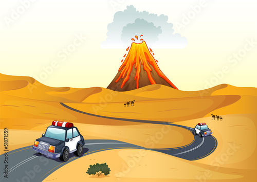A desert with two patrol cars