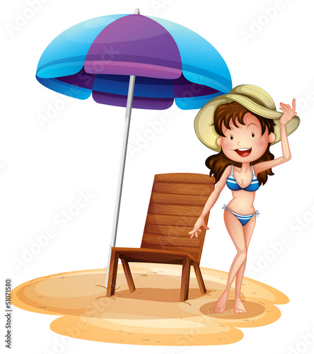 A girl wearing a bikini beside a summer chair and umbrella