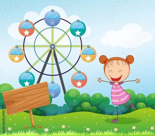A girl in the hill with a wooden signboard