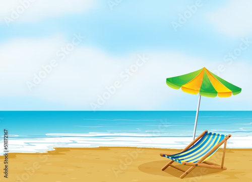 A relaxing beach with an umbrella and a foldable bed