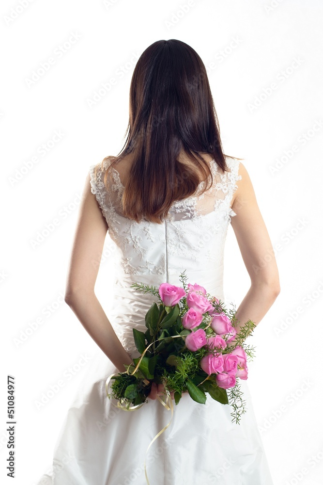 Bride is standing in wedding dress
