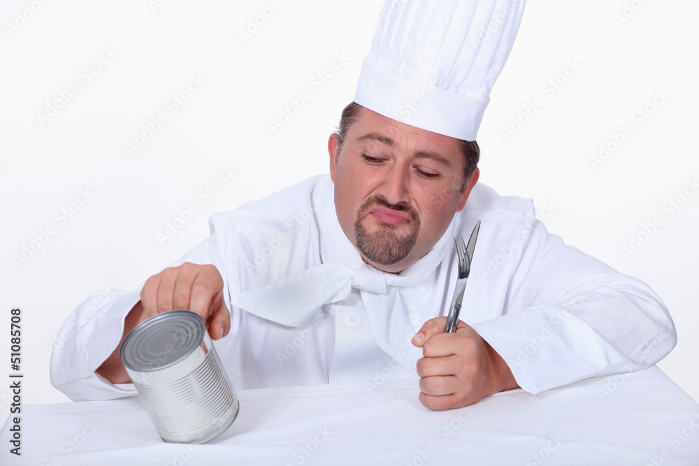 Chef poking tin can Chef poking tin can