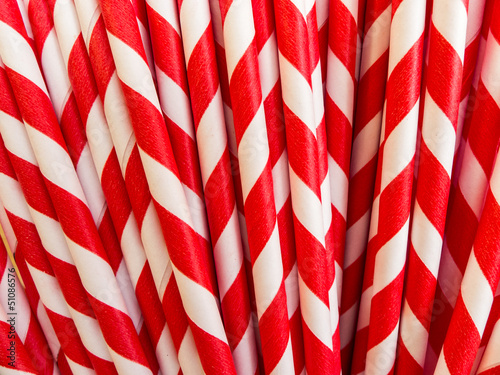 Fototapeta Naklejka Na Ścianę i Meble -  Closeup of red and white paper drinking straws