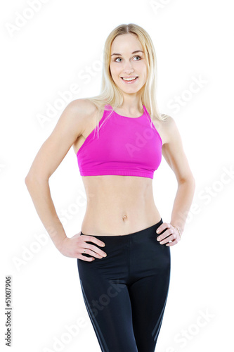 Beautiful healthy fitness woman posing isolated on white © paultarasenko