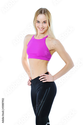 Beautiful healthy fitness woman posing isolated on white