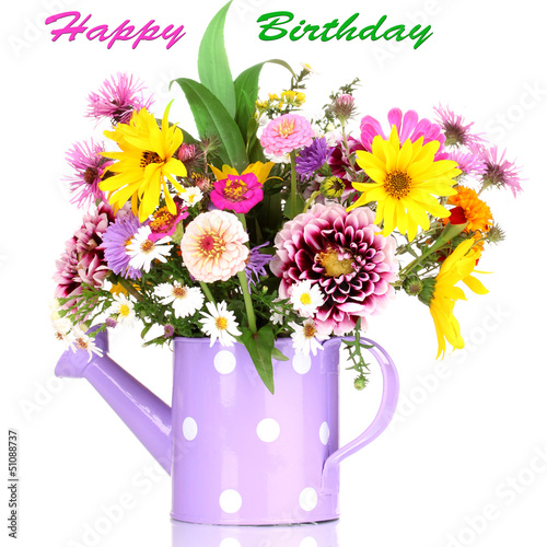 beautiful bouquet of bright flowers in watering can isolated