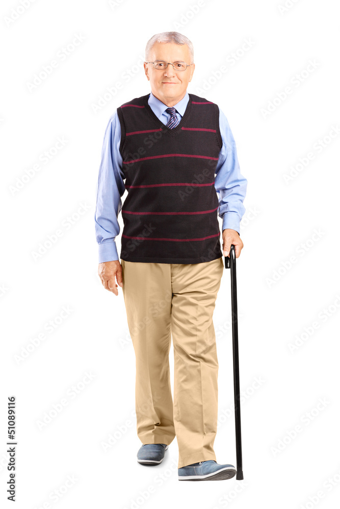 Full length portrait of a senior man walking with a cane Full length portrait of a senior man walking with a cane