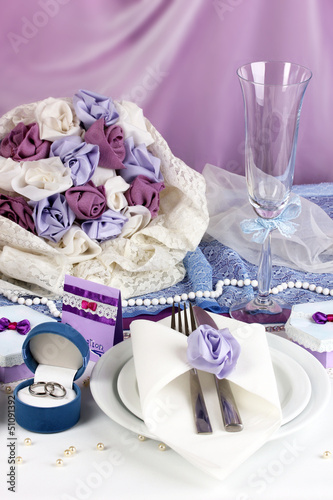 Serving fabulous wedding table in purple color