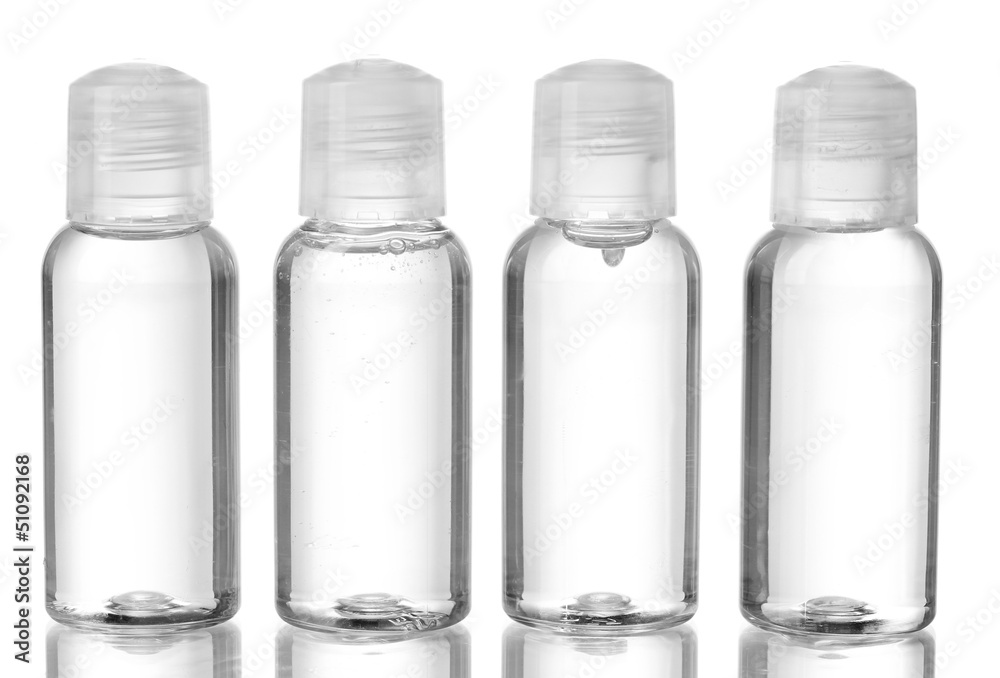 Hotel cosmetic bottles isolated on white