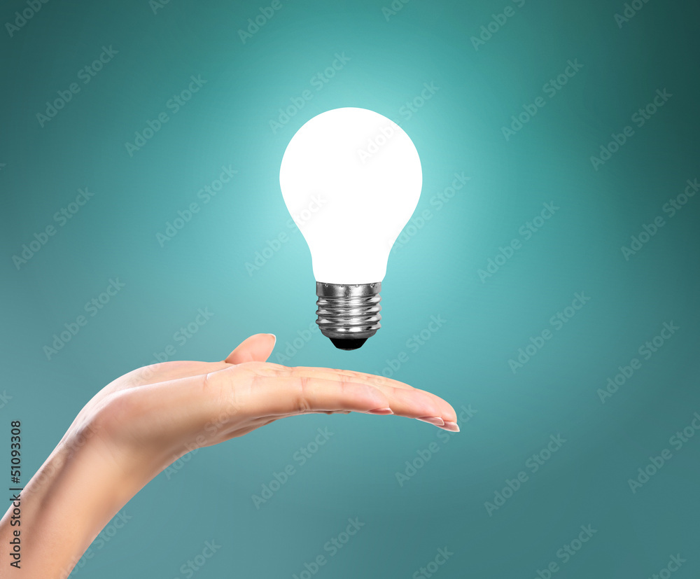 light bulb in a hand light bulb in a hand