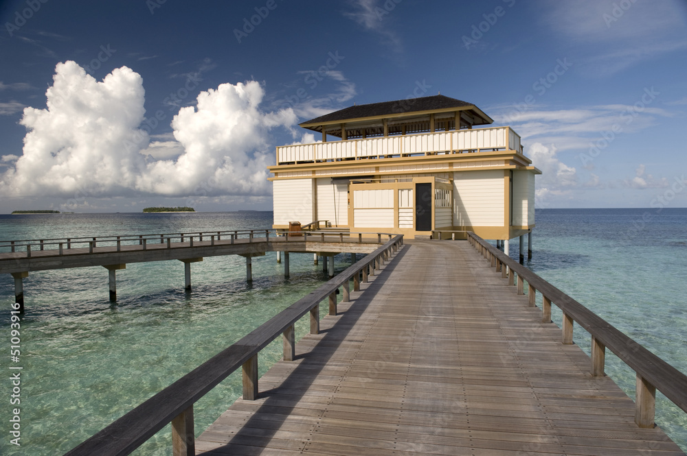 Wood villa in a maldivian lagoon