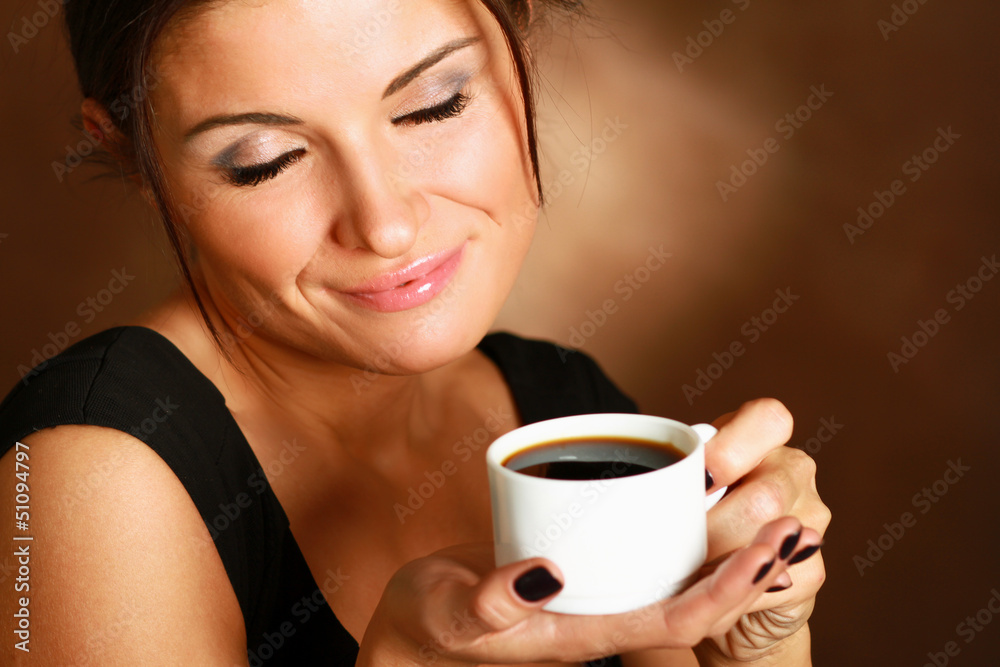Portrait of a woman drinking coffee Portrait of a woman drinking coffee