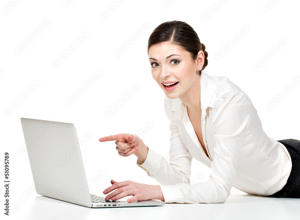 Woman with laptop points to the screen Woman with laptop points to the screen