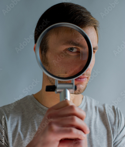 guy with magnifying glass