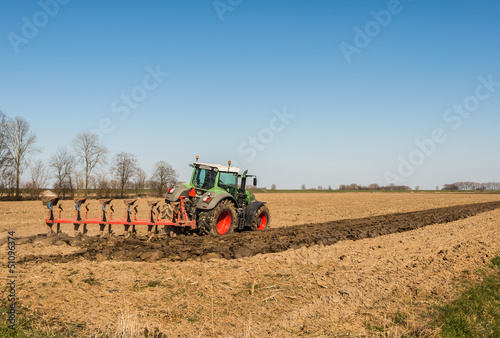 Plowing the farmland