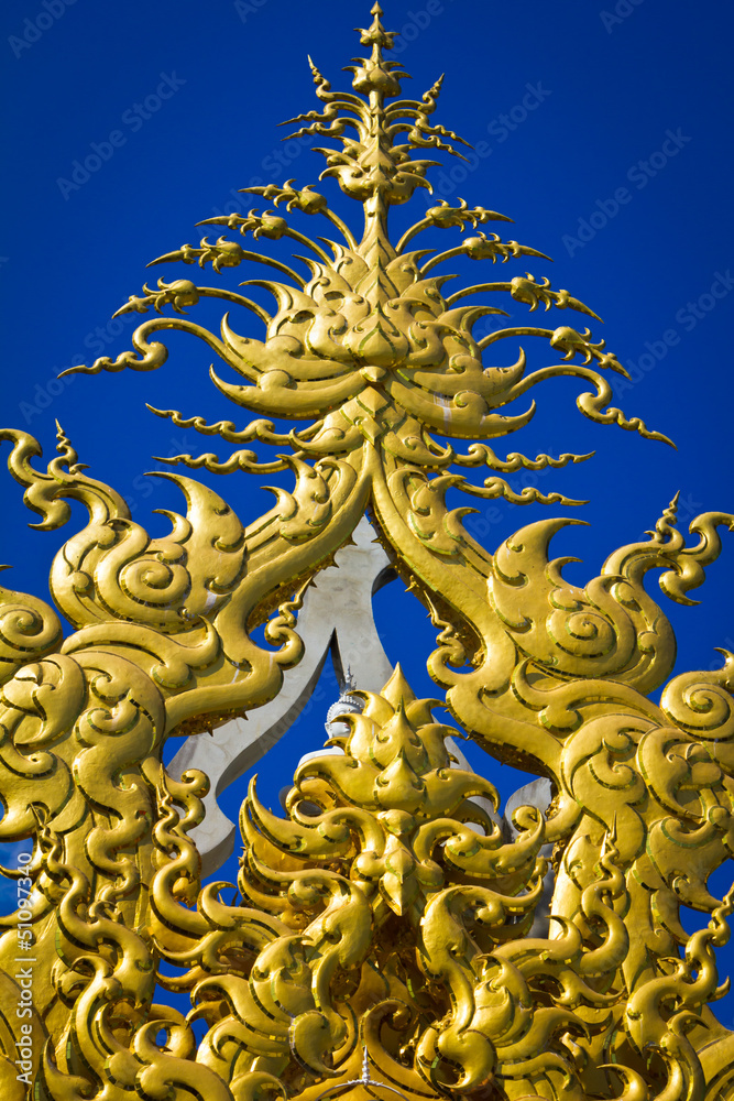 Golden sculpture at Wat Rong Khun, the temple at Chiangrai provi
