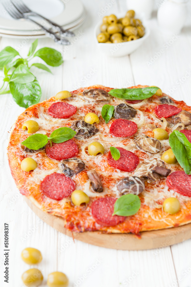 pizza with salami and sliced mushrooms pizza with salami and sliced mushrooms