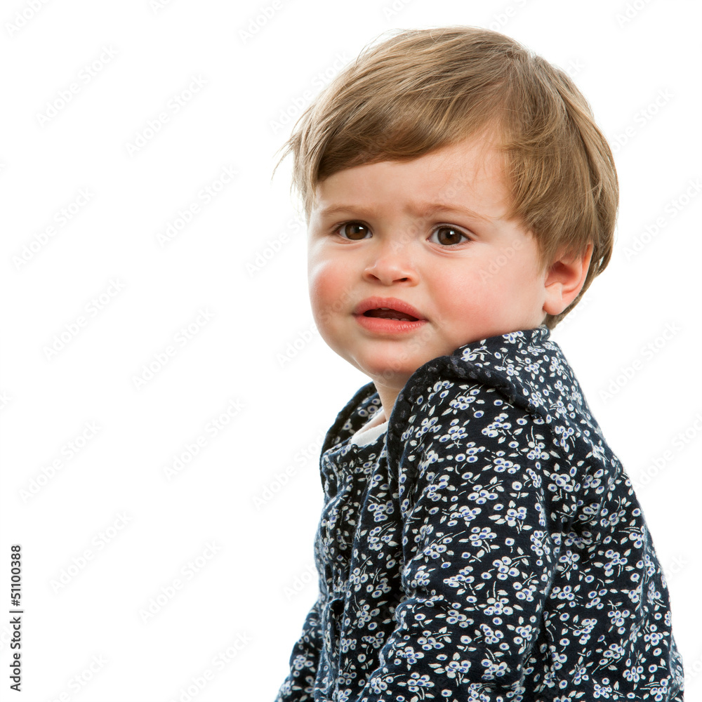 Sweet toddler with confused face expresssion. Sweet toddler with confused face expresssion.