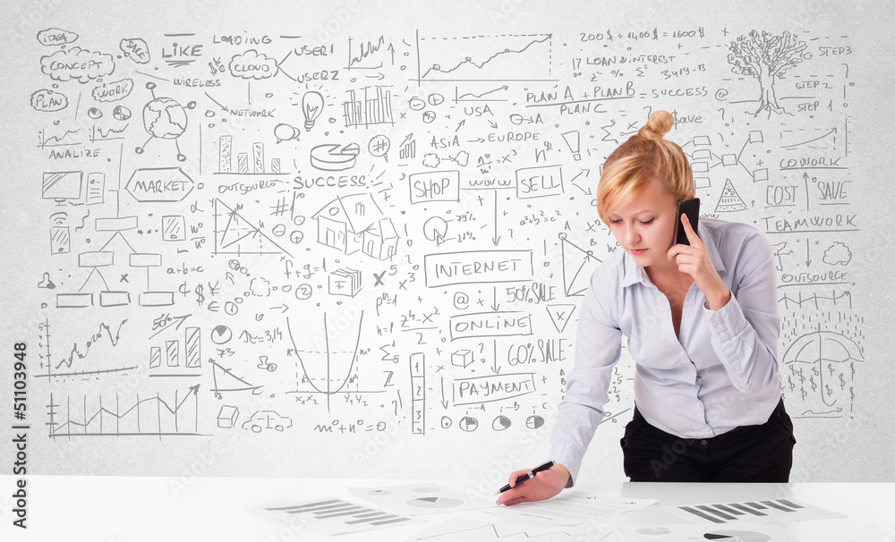 Pretty businesswoman planning and calculating various business i Pretty businesswoman planning and calculating various business i
