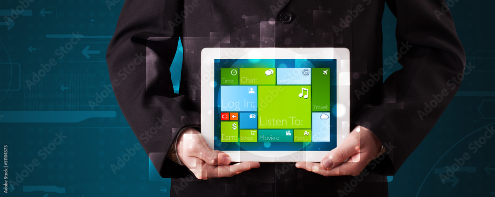 Businessman holding a tablet with modern software operational sy