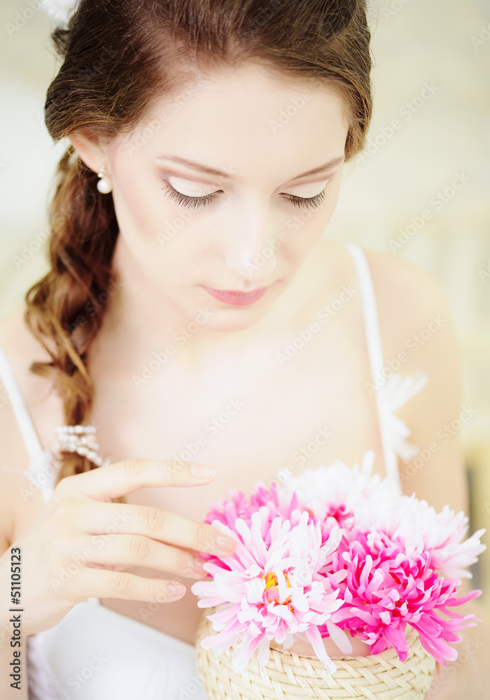 Young Woman with bouqet of chrysanthemum Young Woman with bouqet of chrysanthemum