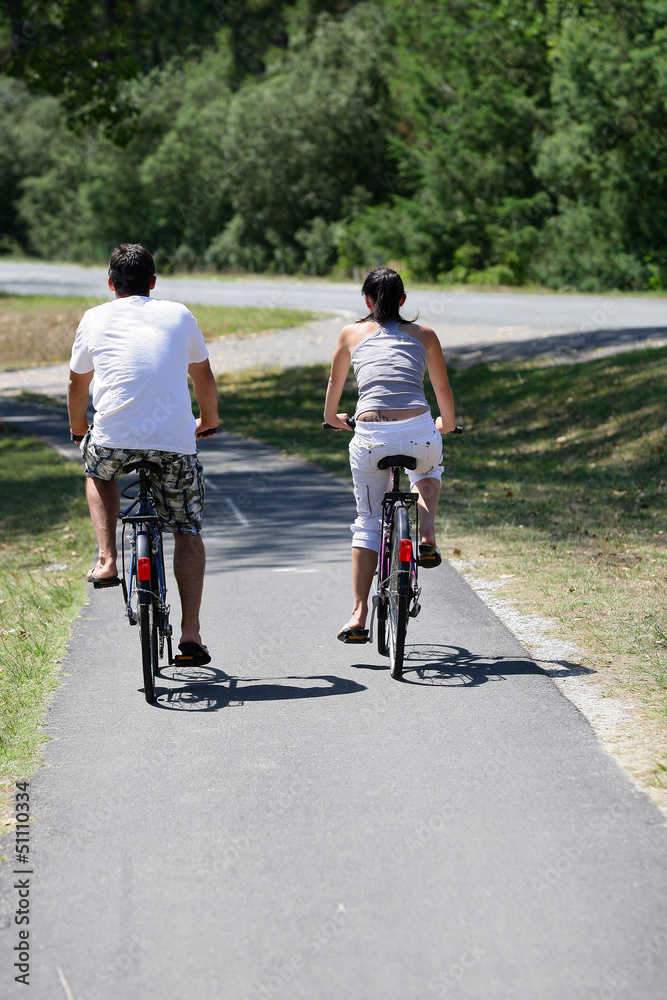 Fototapeta premium Man and woman having a bike ride