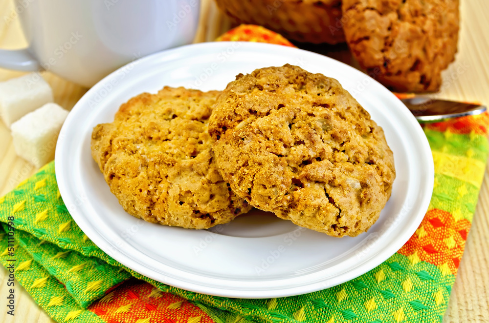 Biscuits on a wooden board with a cup Biscuits on a wooden board with a cup