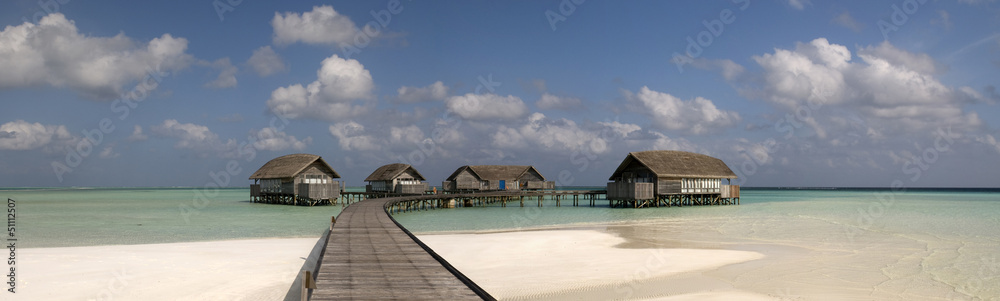 Wood villa in a maldivian lagoon