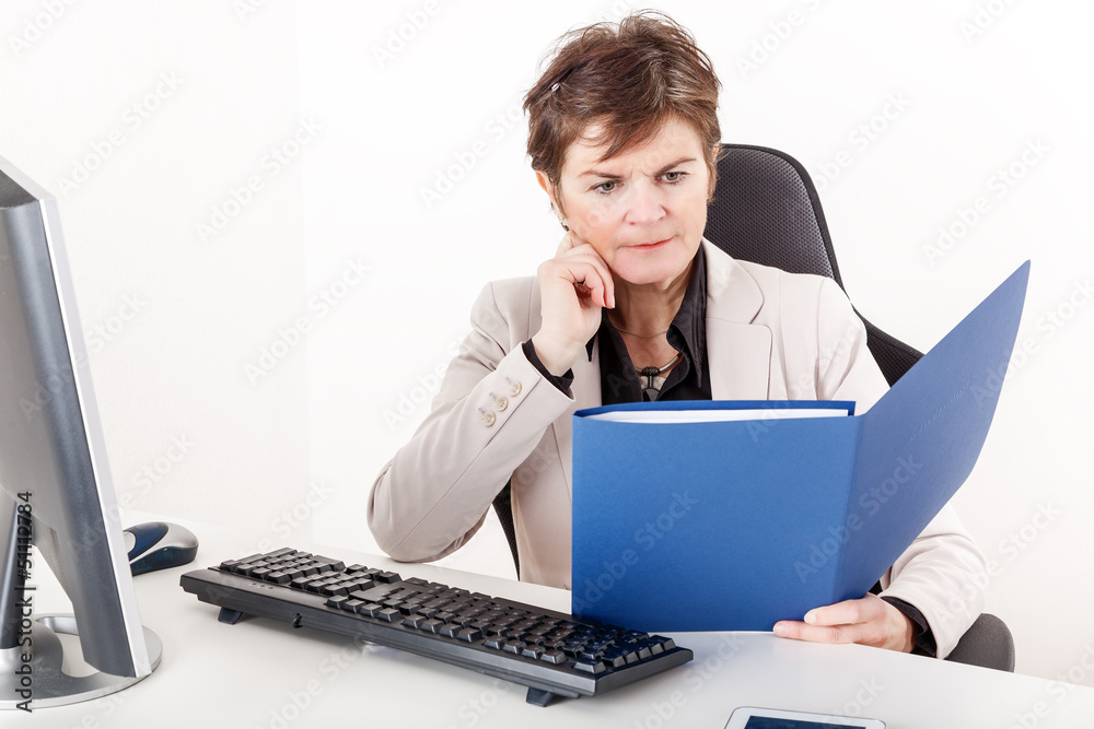 Businesswoman examination of documents Businesswoman examination of documents