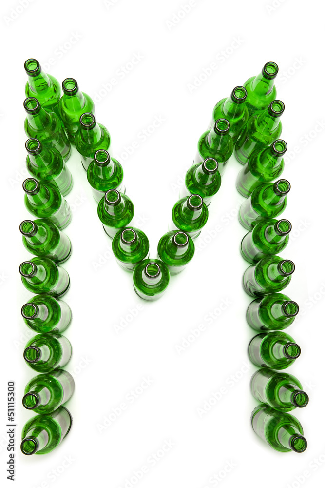 The alphabet from glass beer bottles. Letter M The alphabet from glass beer bottles. Letter M