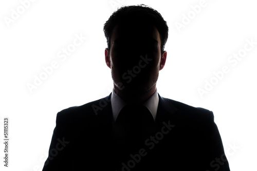 Businessman portrait silhouette and a misterious face photo