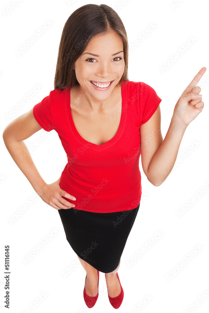 Pointing showing woman smiling cheerful Pointing showing woman smiling cheerful