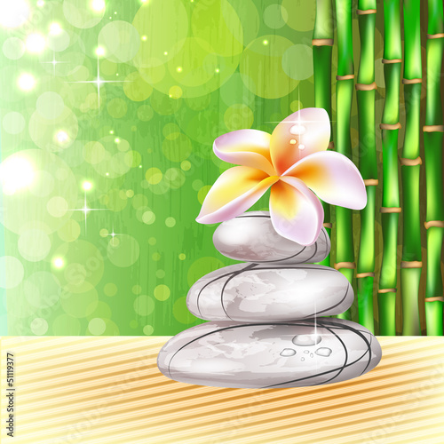Background with spa, bamboo stones and frangipani flower