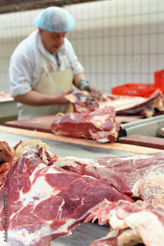 Metzger im Schlachthof // butcher in slaughterhouse