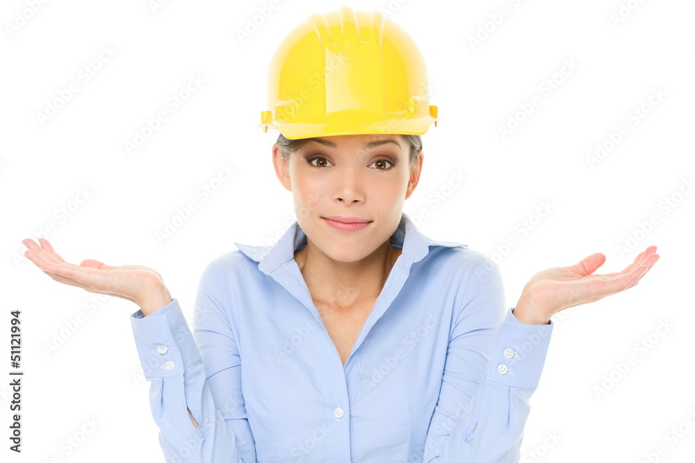 Engineer, entrepreneur or architect woman shrugging Engineer, entrepreneur or architect woman shrugging