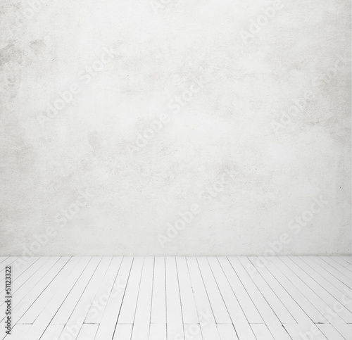 white concrete wall and white wood floor © SFIO CRACHO