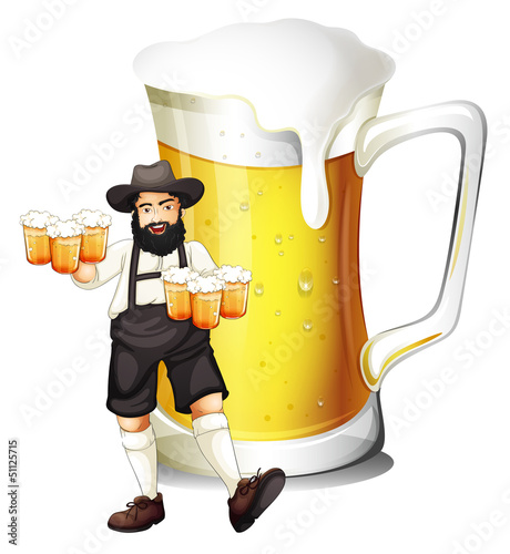 A man with a glass full of beer