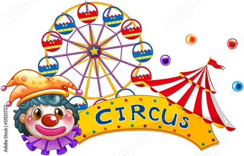 A clown with a circus signage and a ferris wheel at the back
