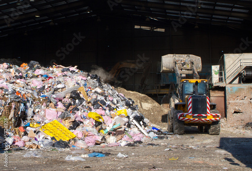 rubbish piled up at a waste management centre © smikeymikey1