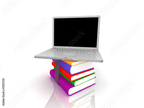 Professional Laptop with books and blank display © PhotoStocker