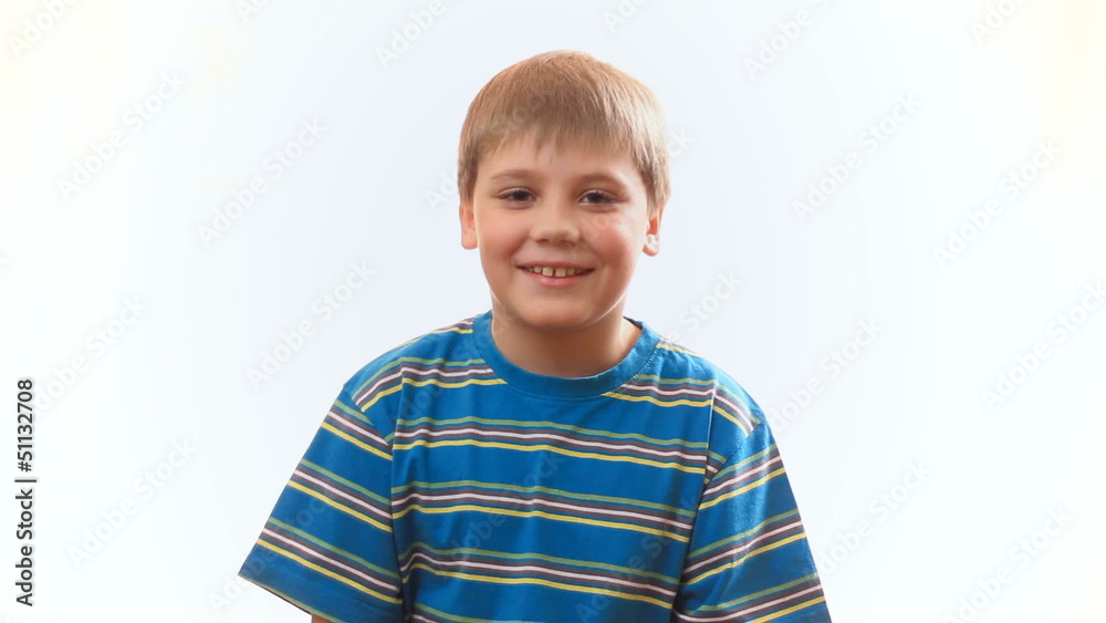The child is happy and clapping. Child emotions The child is happy and clapping. Child emotions