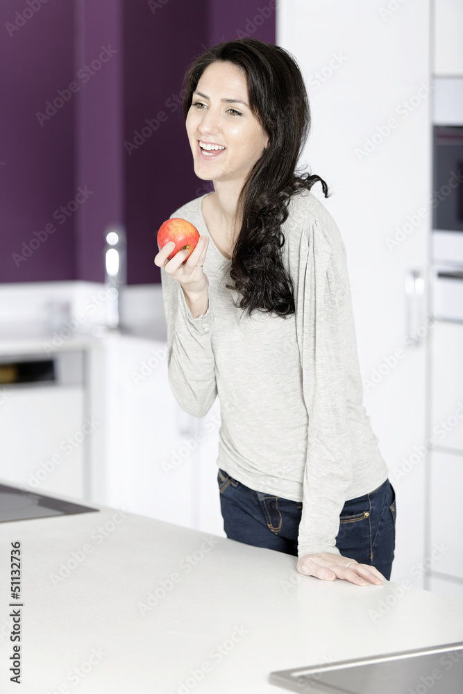 Woman holding an apple Woman holding an apple