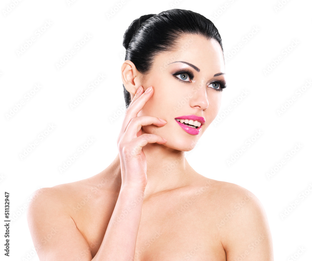 Beautiful expressive woman cares of the skin face Beautiful expressive woman cares of the skin face