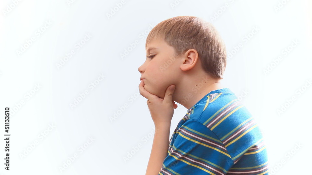 schoolboy thinks, remembers. on a white background schoolboy thinks, remembers. on a white background