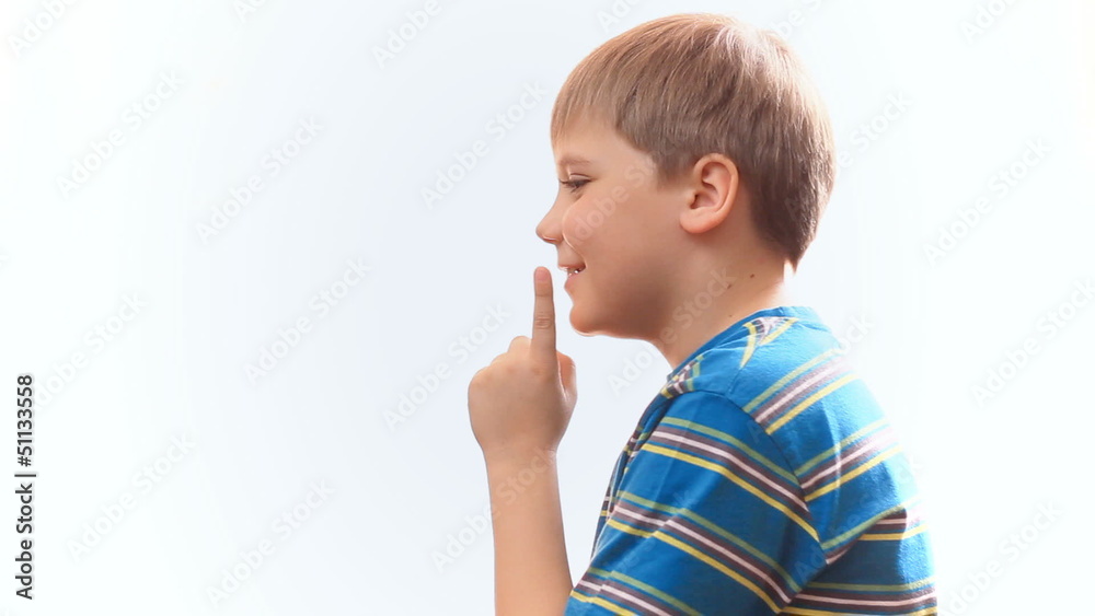 child thinks, schoolboy comes good idea. on a white background child thinks, schoolboy comes good idea. on a white background