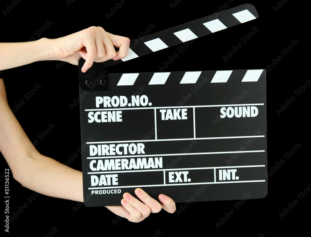 Movie production clapper board isolated on black